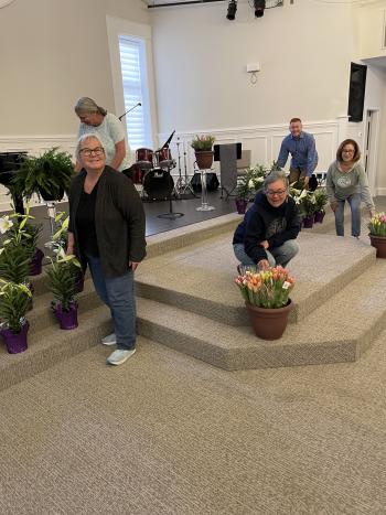 Setting up the flowers in the Sanctuary