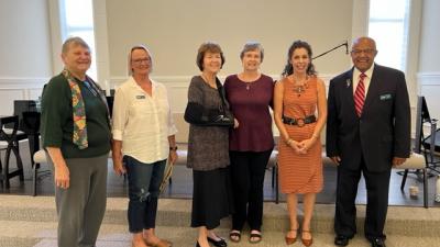 Lainie Mauger, Gloria Bright, Anne Conlan, Gail O'Brien, Rev. Dr. Ellen Contente, and Dr. Herbert Harris