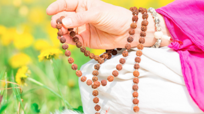 Hand holding beads