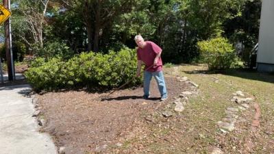 John, preparing the flower beds.